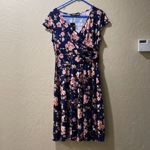Floral dress navy blue background. Summertime breathable stretchy material.